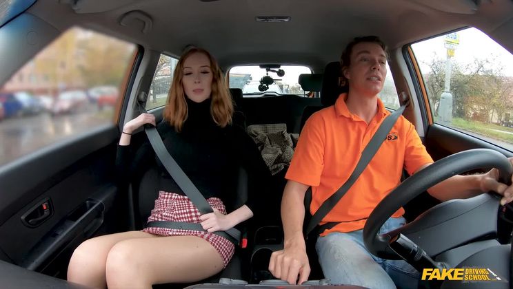 Redhead Distracts with no bra on